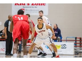 Carleton Ravens guard Marcus Anderson (3) gets into defensive position during a game in the 2017-18 Ontario university men's basketball season. Carleton University Athletics photo.