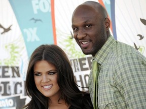 This Aug. 8, 2010 file photo shows Khloe Kardashian and Lamar Odom arriving at the Teen Choice Awards in Universal City, Calif.