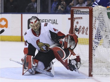 Senators starting goalie Craig Anderson can't corral the puck as Maple Leafs forward Mitch Marner scores his second goal of the opening period, making the score 3-0. Jack Boland/Postmedia
