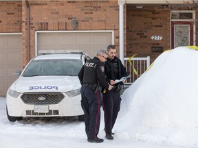 Police maintain a secure perimeter around a townhome at 277 Parkrose Private in east end of Orléans.