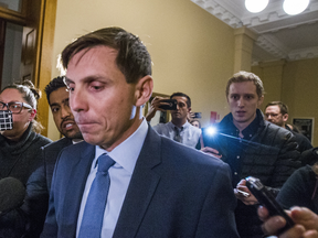 Patrick Brown is followed by reporters after addressing allegations against him on Jan. 24, 2018.