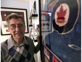 Murray Dowey, a member of the 1948 Olympic champion RCAF Flyers with his sweater.