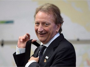 Senators owner Eugene Melnyk reacts following news that the National Capital Commission has approved the results from an evaluation committee regarding the LeBreton Flats redevelopment.