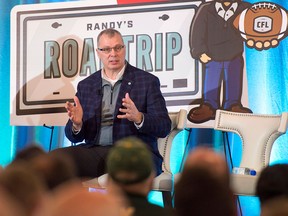 CFL commissioner Randy Ambrosie addresses a crowd at a public town hall meeting in Halifax on Feb. 23, 2018