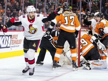 The Ottawa Senators' Derick Brassard, left, celebrates after scoring on the Philadelphia Flyers' Alex Lyon during the first period on Saturday, Feb. 3, 2018 in Philadelphia.