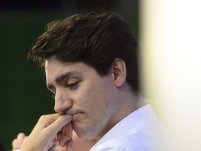 Prime Minister Justin Trudeau listens to a question as he takes part in the Young Changemakers Conclave 2018 in New Delhi, India on Saturday, Feb. 24, 2018.