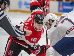67's centre Sasha Chmelevski (8) faces off against Hayden McCool of the Generals in the first period of Saturday's game. Valerie Wutti/Blitzen Photography/OSEG