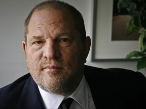 In this Nov. 23, 2011 file photo, film producer Harvey Weinstein poses for a photo in New York. Weinstein has asked a judge to toss out a federal sexual misconduct lawsuit filed against him and he's invoking the words of some A-list actresses in his defense. (AP Photo/John Carucci, File)