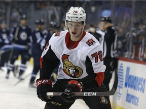 Senators defenceman Thomas Chabot retreats for a puck as the Jets change lines during NHL action in Winnipeg on Dec. 3, 2017.