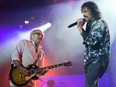 Original Foreigner band member Mick Jones and lead singer Kelly Hansen rock on stage at Bluesfest in 2014.