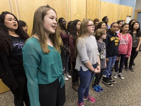 Hannah Villeneuve sings with the "Vocal Rush" choir at St. Francis Xavier Catholic High School. The choir won a contest to sing backup with classic rock band Foreigner in concert at TD Place in Ottawa. March 21,2018. Errol McGihon/Postmedia
