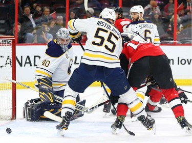 The Ottawa Senators can't get the puck past Robin Lehner of the Buffalo Sabres during the first period.