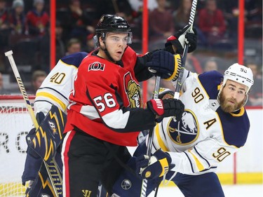 Magnus Paajarvi of the Ottawa Senators battles against Ryan O'Reilly of the Buffalo Sabres during the first period at the Canadian Tire Centre on Thursday, March 08, 2018.