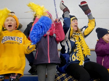 Metcalfe Hornets fans included, left to right: Molly Rose, 7, Alyssa Nolan, 7, Erin Gagné and her daughter Juliette Gagné, 6.  Julie Oliver/Postmedia
