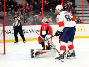 Senators goalie Mike Condon reacts after the Panthers scored their fifth goal of the night on Tuesday. (WAYNE CUDDINGTON/Postmedia
 Network)