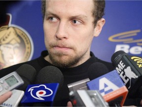 Dany Heatley, then with the Senators, addresses the media in 2007. Heatley was one of the players allegedly defrauded by former agent Stacey Don McAlpine, who died March 6. Errol McGihon/Postmedia files
