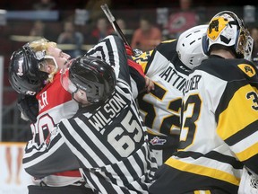Ottawa's Tye Felhaber (left) fights through a ref to get to Hamilton's Nicolas Mattinen in Game 3 at Td Place on Tuesday. (Julie Oliver/Postmedia Network)