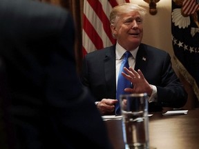 U.S. President Donald Trump speaks during a meeting with bipartisan members of the Congress at the Cabinet Room of the White House February 28, 2018 in Washington, DC.