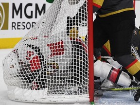 Senators defenceman Mark Borowiecki finds his own way to the back of the Golden Knights net after being shoved into the goal by a defender in the first period of the game at T-Mobile Arena.