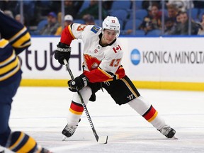 Johnny Gaudreau of the Flames skates up ice with the puck during the third period of Wednesday's game against the Sabres in Buffalo.