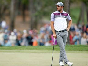 Corey Conners looks on on the 18th hole during the third round of the Valspar Championship on Saturday in Palm Harbor, Fla.