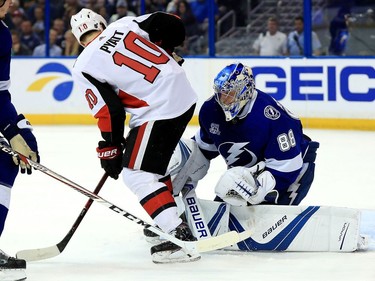 Tom Pyatt #10 of the Ottawa Senators scores a goal on Andrei Vasilevskiy #88 of the Tampa Bay Lightning during a game at Amalie Arena on March 13, 2018 in Tampa, Florida.