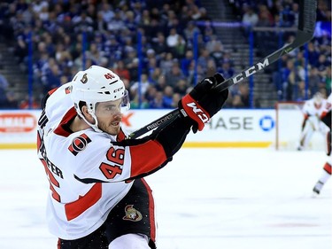 Erik Burgdoerfer #46 of the Ottawa Senators shoots during a game against the Tampa Bay Lightning at Amalie Arena on March 13, 2018 in Tampa, Florida.