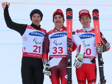 These are the medallists from the standing men's giant slalom event on Wednesday, left to right: silver medallist Aleksei Bugaev of Neutral Paralympic Athlete, gold medallist Theo Gmur of Switzerland and bronze medallist Alexis Guimond of Gatineau.