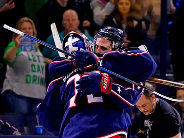 Blue Jackets netminder Sergei Bobrovsky is congratulated by Nick Foligno after victory was clinched on Saturday night.