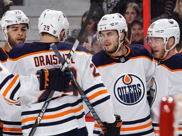 Drake Caggiula #91 of the Edmonton Oilers celebrates his first period goal against the Ottawa Senators with teammates Pontus Aberg #46, Leon Draisaitl #29 and Darnell Nurse #25 at Canadian Tire Centre on March 22, 2018 in Ottawa.