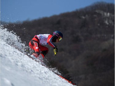 Gatineau's Alexis Guimond races down the course on the first run of the standing men's giant slalom on Wednesday.