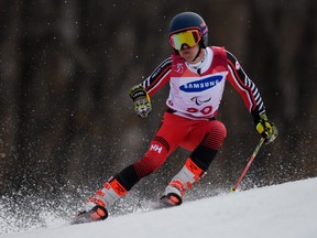 Canada's Alexis Guimond competes during the Standing Men's Giant Slalom run 2 at the Jeongseon Alpine Centre during the Pyeongchang 2018 Winter Paralympic Games in Pyeongchang on March 14, 2018. (AFP PHOTO / OIS/IOC / Joel Marklund )