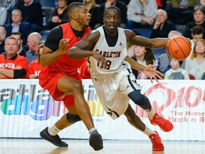 The Carleton Ravens' Munis Tutu drives around a defender against Acadia on Thursday, March 8, 2018, in Halifax.