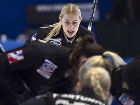 Russia skip Victoria Moiseeva calls for the sweep on one of her shots as they play the United States during the bronze medal game at the World Women's Curling Championship Sunday, March 25, 2018 in North Bay, Ont.