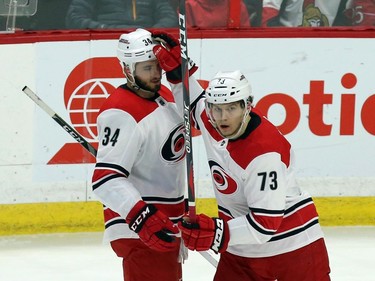 The Hurricanes' Phillip Di Giuseppe (34) celebrates his goal, which gave the visitors a 1-0 lead, with teammate Valetin Zykov.