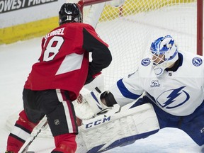 Ottawa Senators left wing Ryan Dzingel scores against the Tampa Bay Lightning.