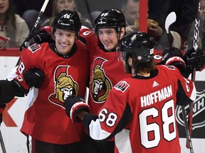 Senators winger Ryan Dzingel, left, celebrates his goal with Matt Duchene, middle, and Mike Hoffman during a March 8 home game against the Sabres. Combined, they had 16 goals and 12 assists in 10 games before facing the Blue Jackets on Saturday night.