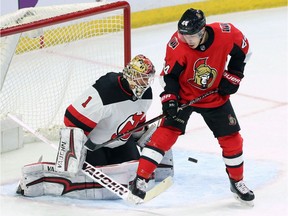 Senators centre Jean-Gabriel Pageau screens Devils netminder Keith Kinkaid, leading to an Ottawa goal during a game on Feb. 6.