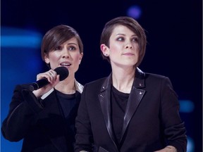 Tegan and Sarah celebrate their Juno for Single of the Year during the Juno Awards in Winnipeg, Sunday, March 30, 2014.