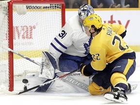 Toronto Maple Leafs goaltender Frederik Andersen (31) blocks a shot against Nashville Predators left wing Kevin Fiala (22) Thursday, March 22, 2018, in Nashville, Tenn. (AP Photo/Mark Humphrey)