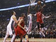 Raptors' OG Anunoby (3) goes in for the slam during first half NBA action against the Nuggets in Toronto on Tuesday, March 27, 2018.