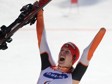 Canada's Mollie Jepsen rejoices after winning a bronze medal in the standing women's giant slalom event on Wednesday.