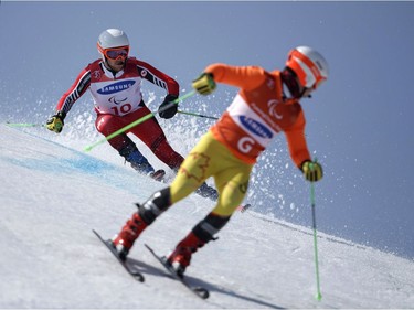 Canada's Mac Marcoux and guide Jack Leitch compete during the visually impaired men's giant slalom race on Wednesday. Simon Bruty/OIS/IOC via AP