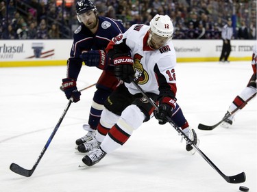 Ottawa forward Marian Gaborik controls the puck next to Columbus forward Brandon Dubinsky during the first period.