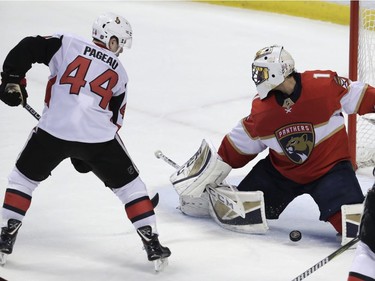 Ottawa Senators' Jean-Gabriel Pageau (44) scores a goal past Florida Panthers goaltender Roberto Luongo (1) during the third period of an NHL hockey game, Monday, March 12, 2018, in Sunrise, Fla.