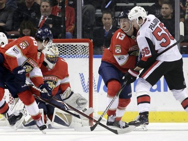 Ottawa Senators' Magnus Paajarvi (56) scores a goal past Florida Panthers goaltender Roberto Luongo, second from left, during the first period of an NHL hockey game, Monday, March 12, 2018, in Sunrise, Fla.