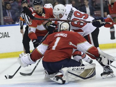 Ottawa Senators' Max McCormick (89) attempts a shot on goal as Florida Panthers goaltender Roberto Luongo (1) defends during the second period of an NHL hockey game, Monday, March 12, 2018, in Sunrise, Fla.