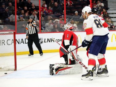 Goalie Mike Condon reacts the fifth Florida goal of the game in the second period as the Ottawa Senators take on the Florida Panthers in NHL action at the Canadian Tire Centre in Ottawa.  Photo by Wayne Cuddington/ Postmedia