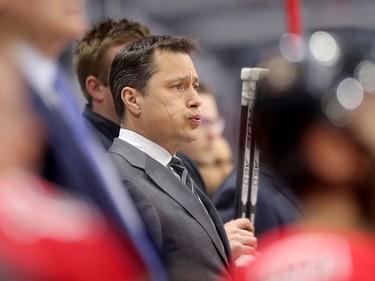 Coach Guy Boucher reacts to a play on the ice in the first period as the Ottawa Senators take on the Florida Panthers in NHL action at the Canadian Tire Centre in Ottawa.  Photo by Wayne Cuddington/ Postmedia