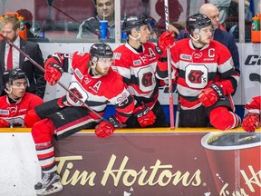 67's forwards Tye Felhaber (29), Sasha Chmelevski, middle, and Travis Barron, the team's captain, prepare to step on the ice during an Ontario Hockey League regular-season game at TD Place arena. Valerie Wutti/Blitzen Photography/OSEG